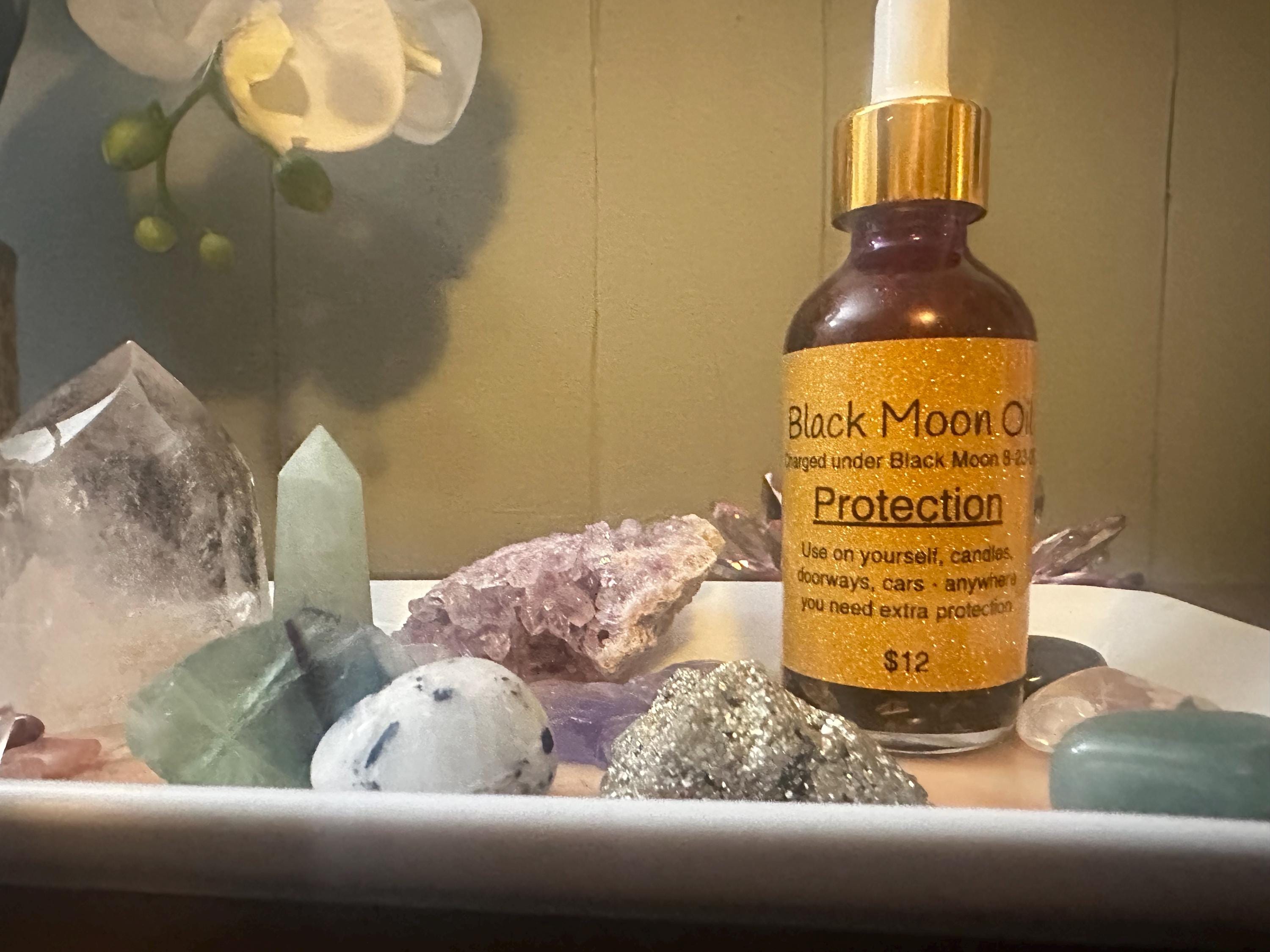 Black Moon Charged Protection or Abundance Oil