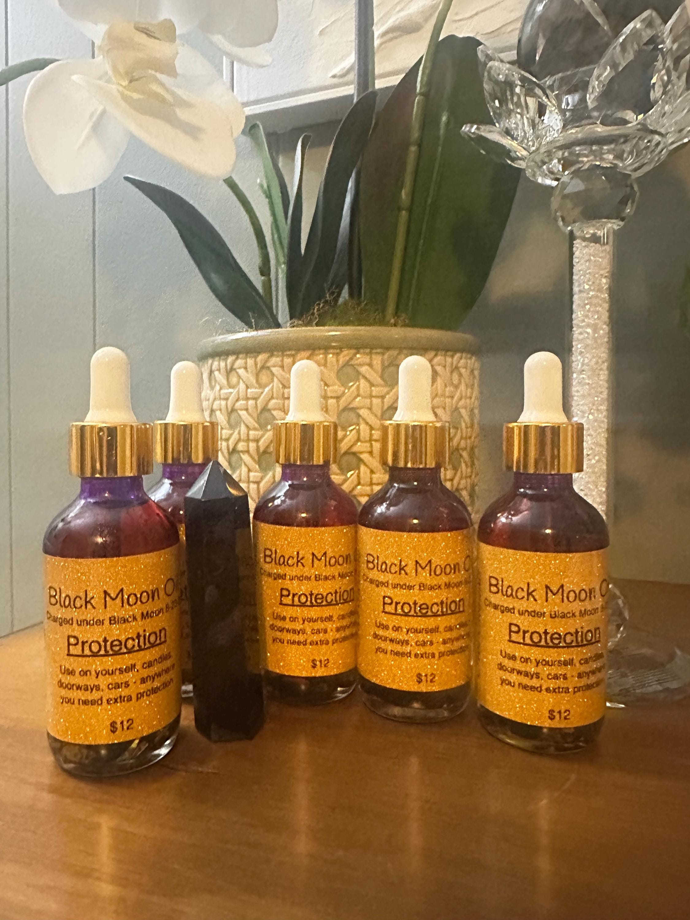 Black Moon Charged Protection or Abundance Oil